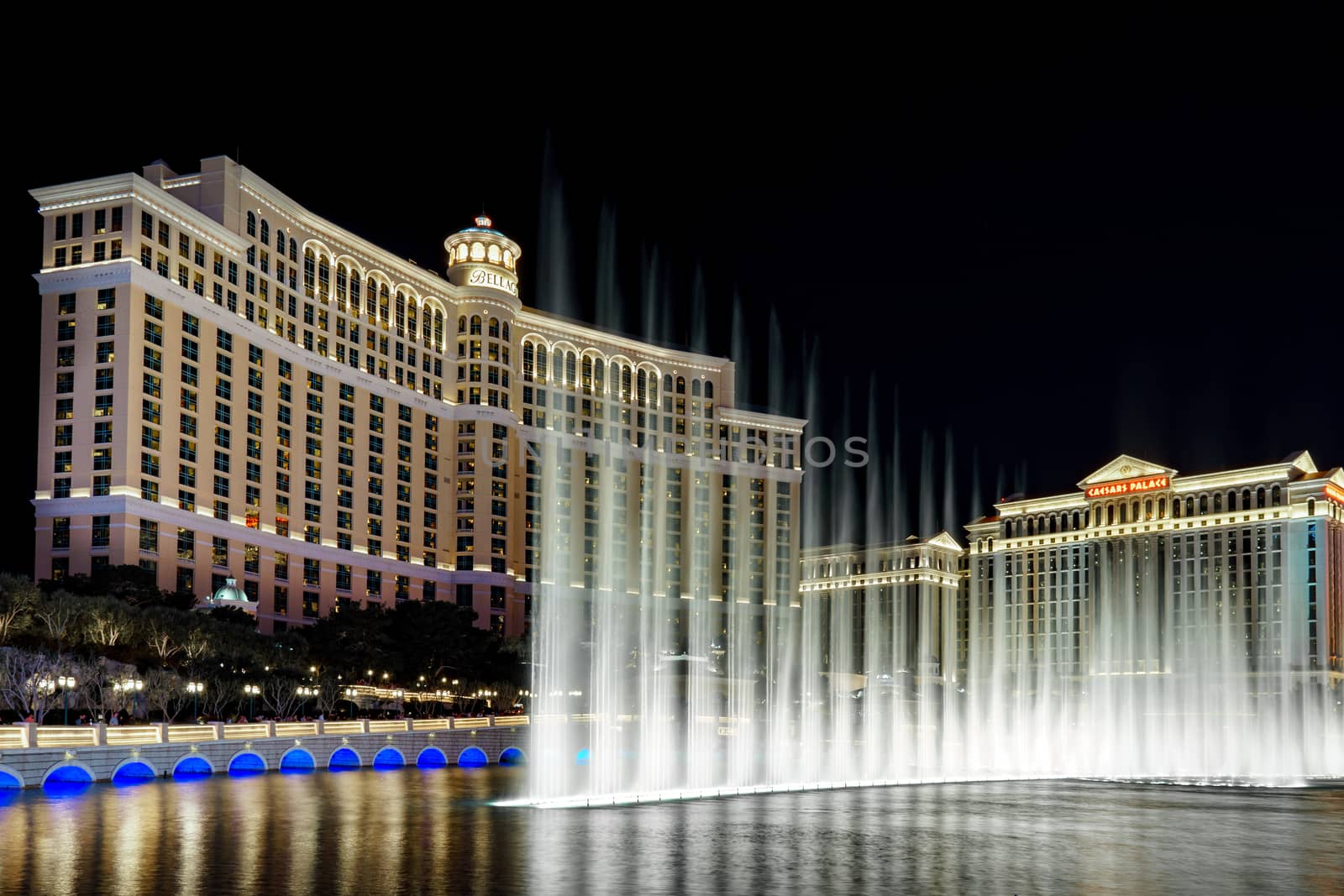 LAS VEGAS, NV/USA - FEBRUARY 13, 2016: Night music fountain at the The Bellagio hotel and casino on the Las Vegas Strip. The Bellagio is owned and operated by MGM Resorts International.