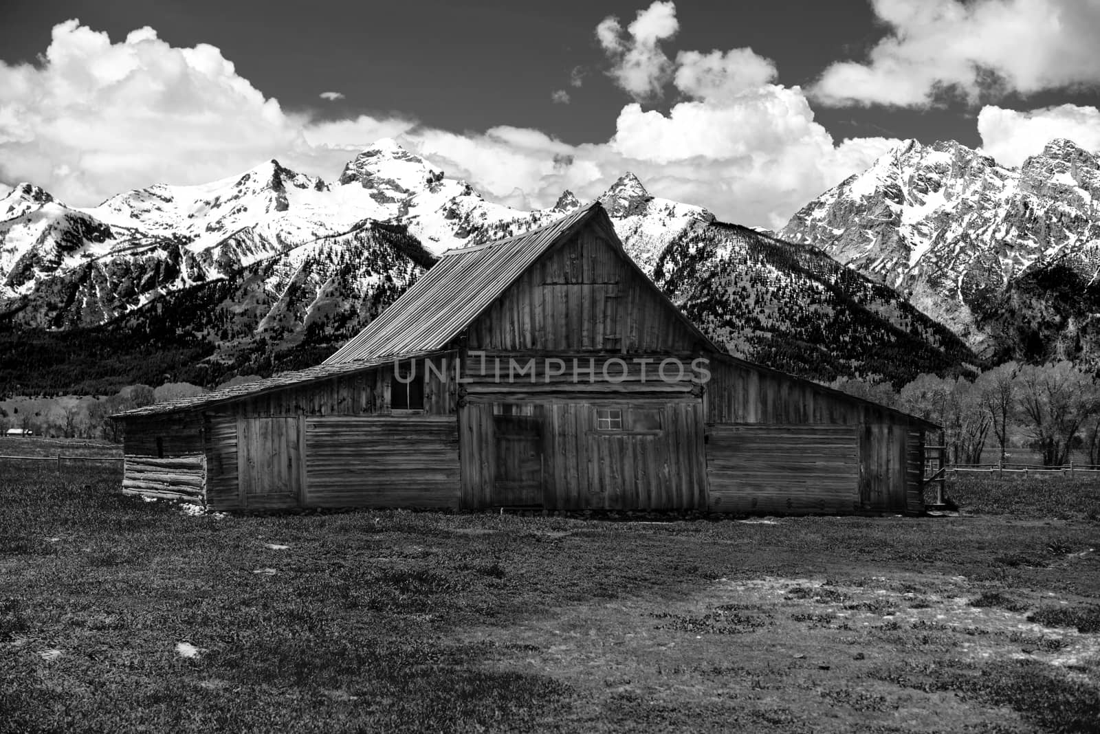 The Moulton Barn and the Teton Mountain Range in Grand Teton National Park, Wyoming.