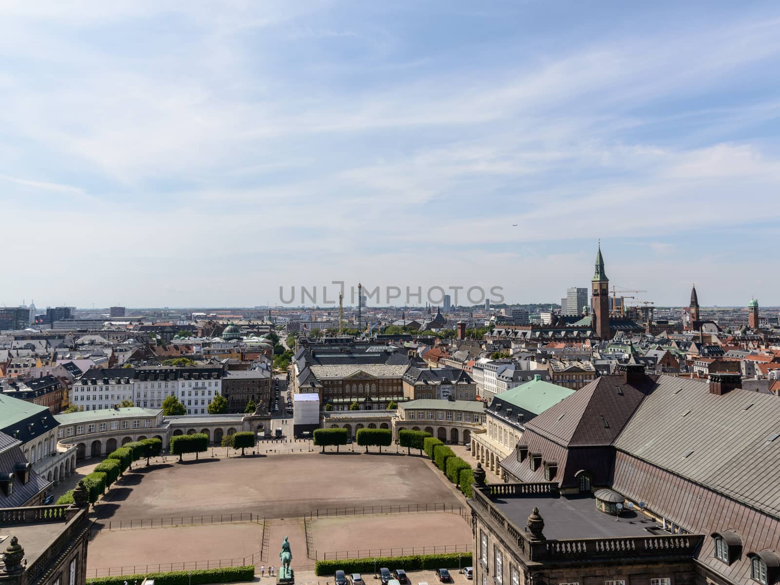 Copenhagen panoramic view from Amalienborg Palace and its square with roofs and buildings.