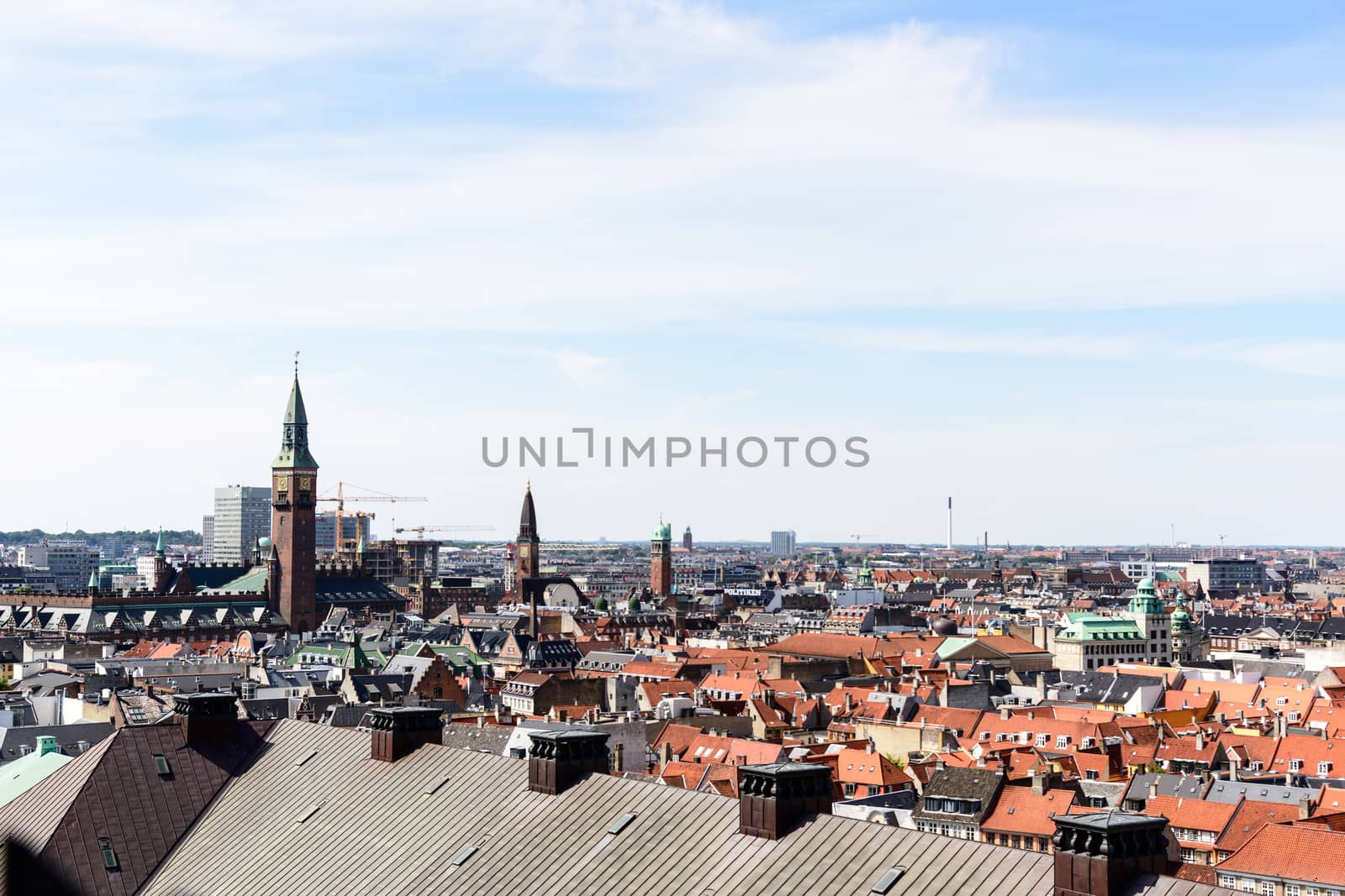 Copenhagen panoramic view from Amalienborg Palace and its square with roofs and buildings.