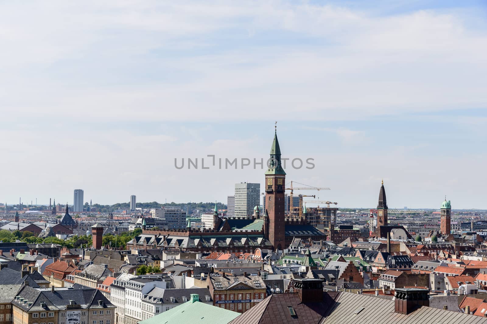 Copenhagen panoramic view from Amalienborg Palace and its square with roofs and buildings.