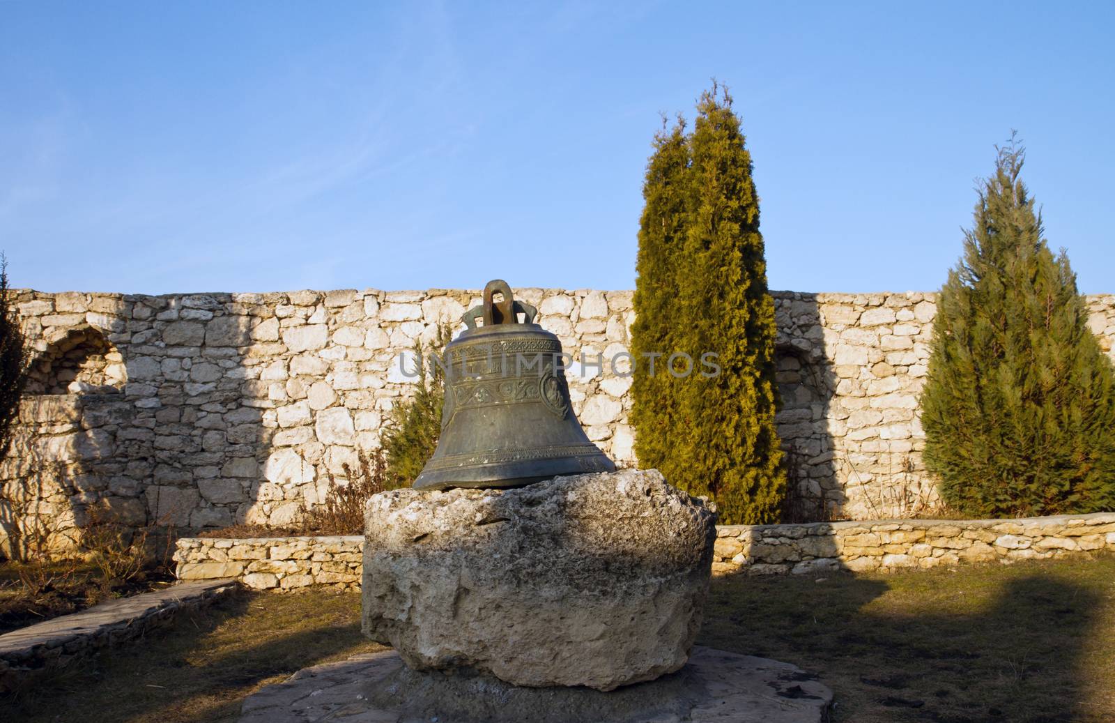 Huge old church bell on the stone