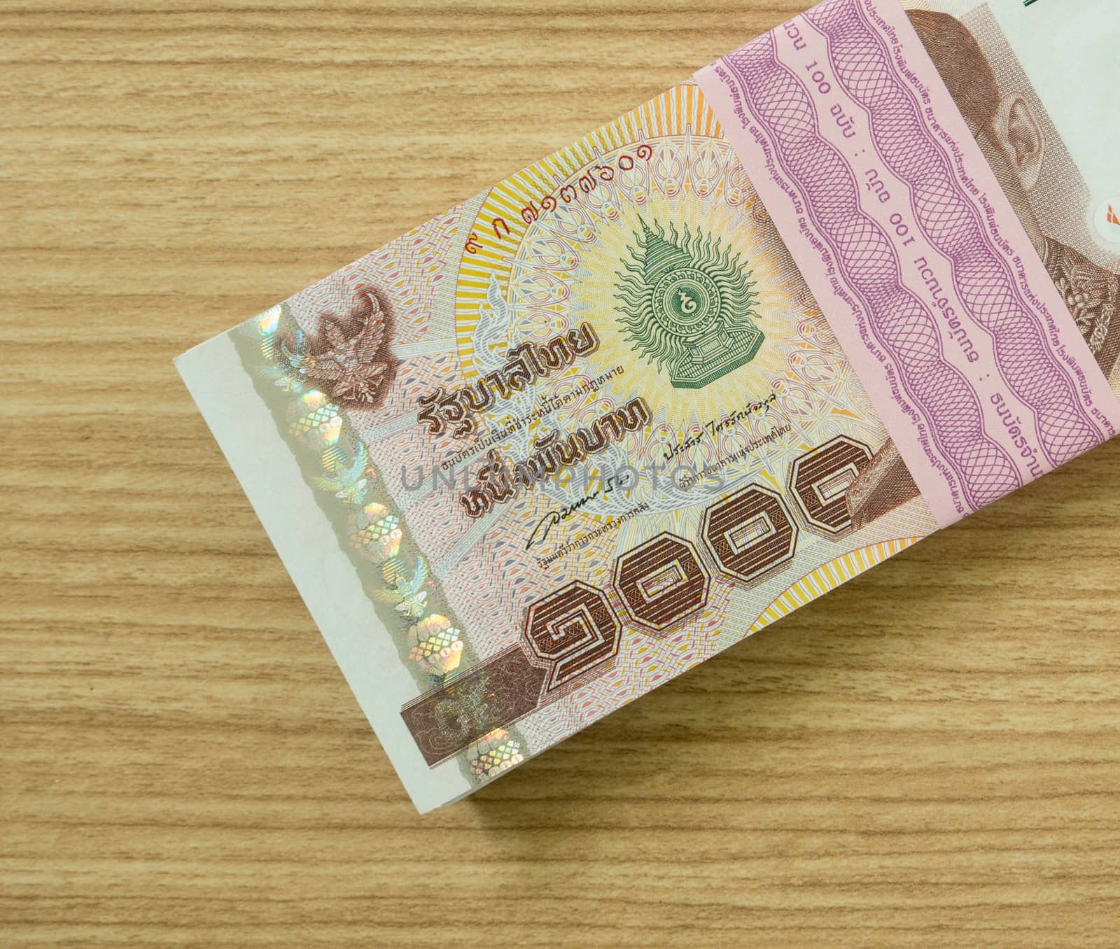 one Thousand  thai banknotes put on table .  money concept