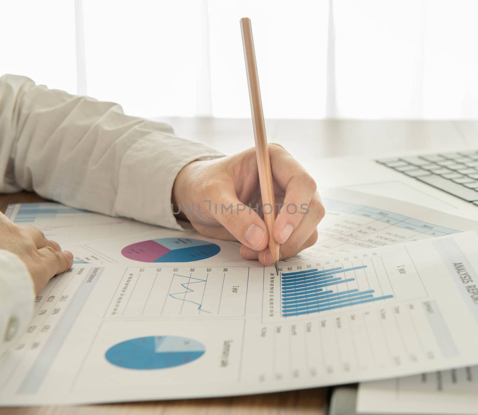 Businessmen are analyzing the data from the report.
