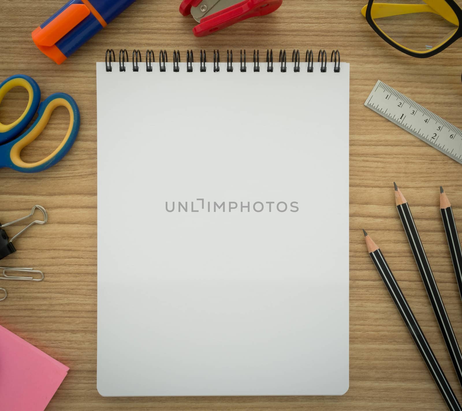 Notebook and stationery on desk. education concept , view top.