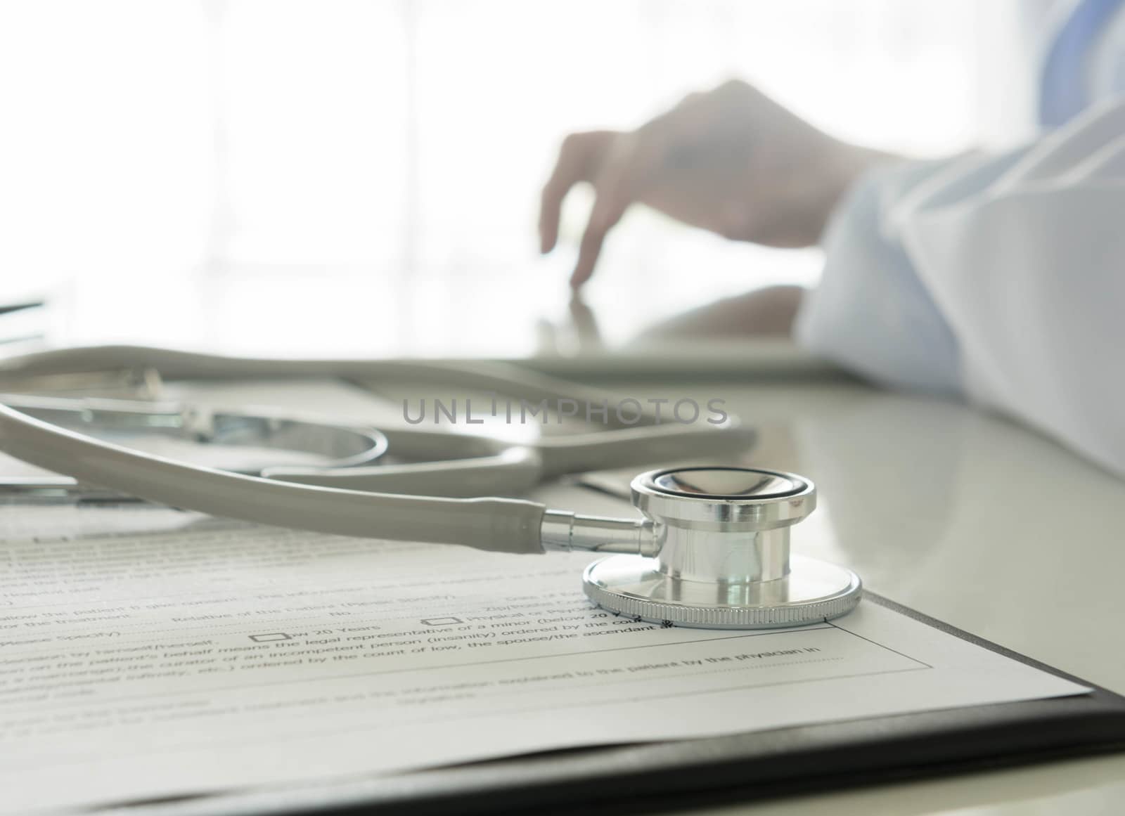 Close-up of stethoscope and medical Documentation on  background doctor working
