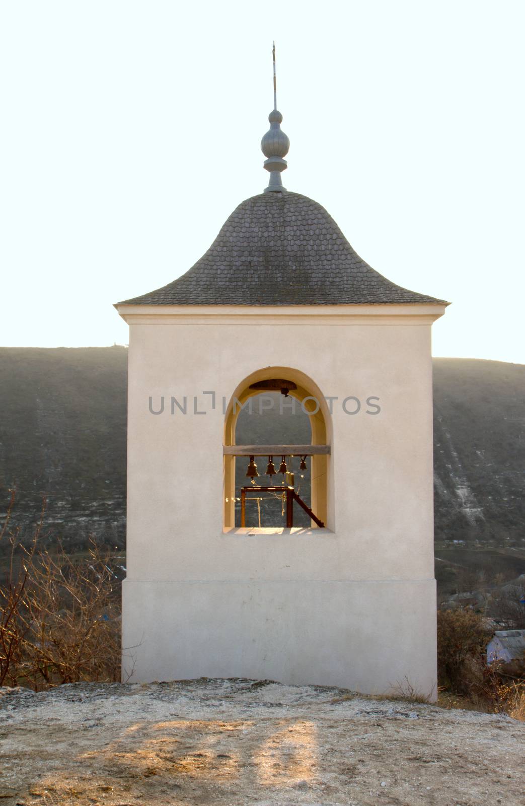 Winter Orhei Vechi monastery bell tower in Moldova.