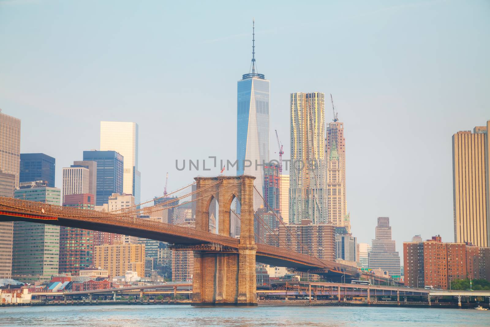 Lower Manhattan cityscape with the Brooklyn bridge by AndreyKr