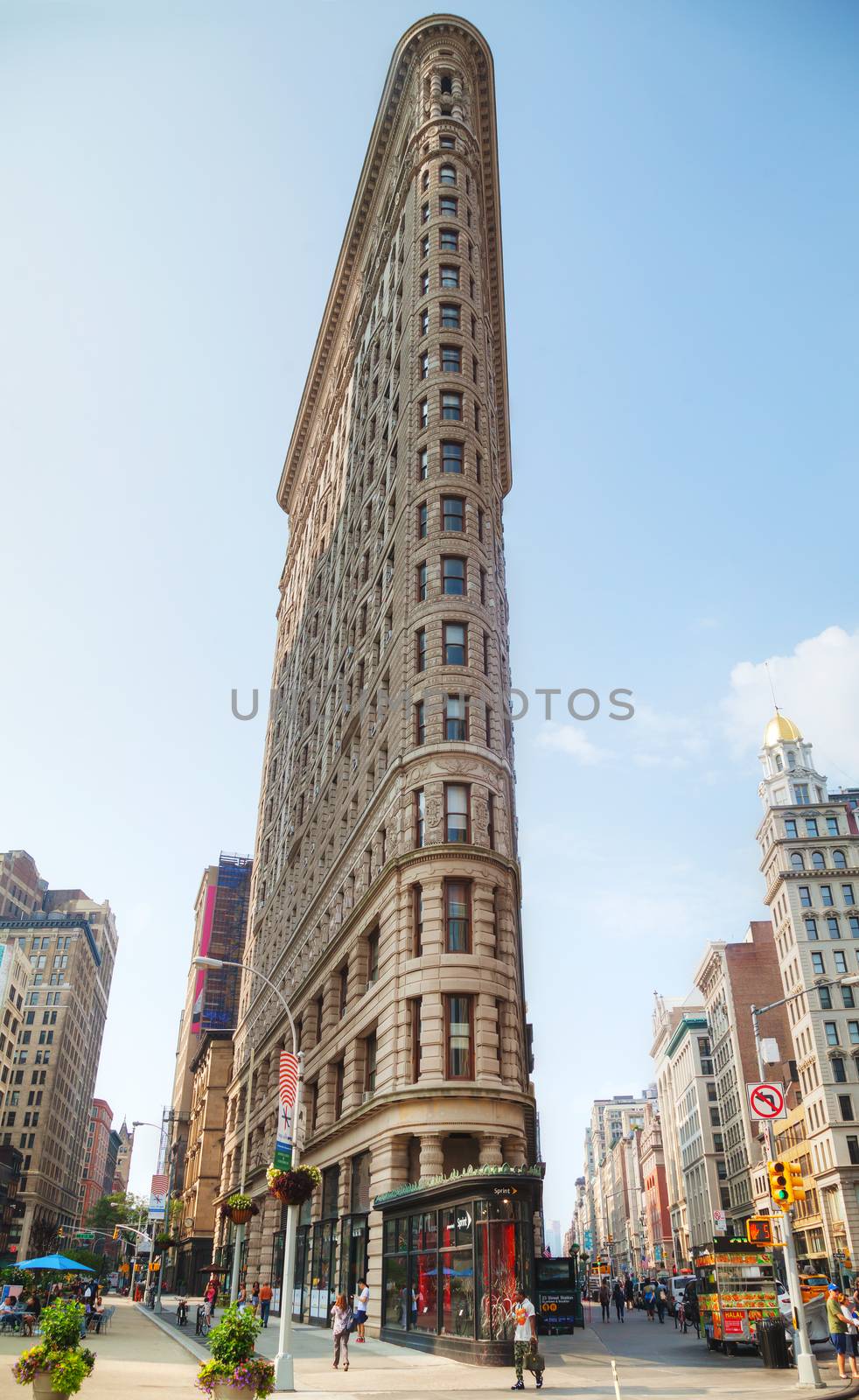 NEW YORK CITY - September 4: Flatiron Building on September 4, 2015 in New York. It's located at 175 Fifth Avenue in the borough of Manhattan and is considered to be a groundbreaking skyscraper.