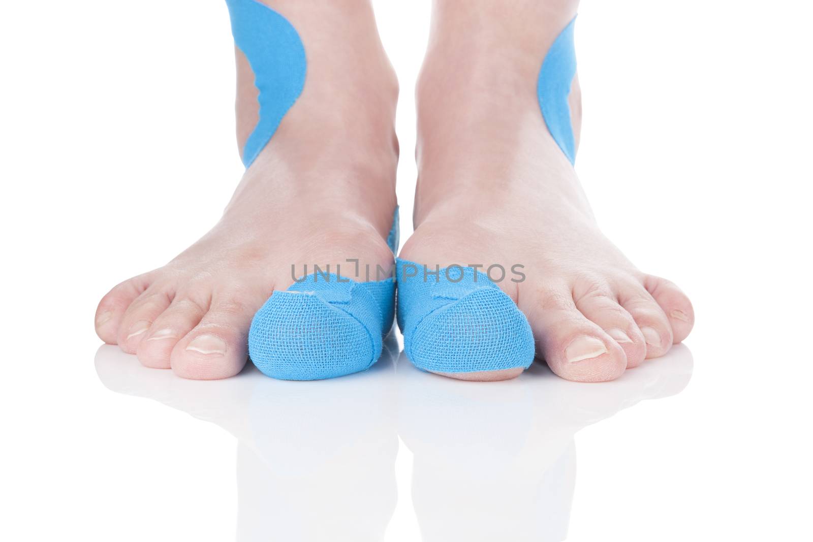 Kinesio tape on female foot. by eskymaks