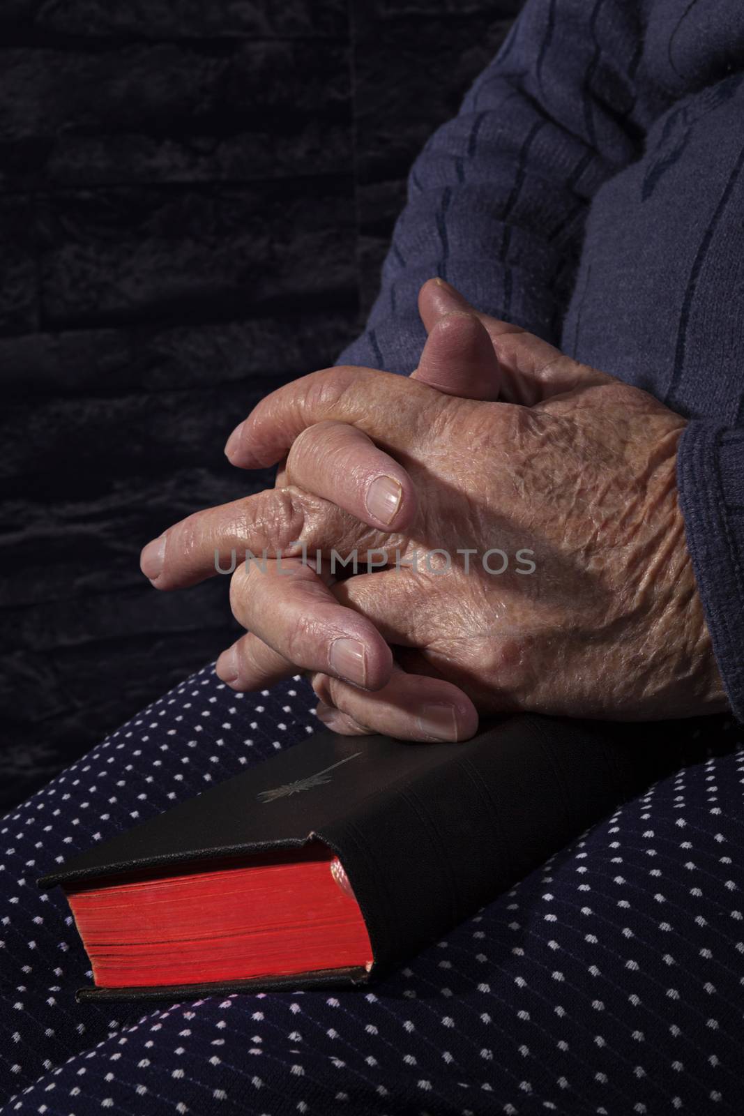 Grandmother praying. by eskymaks