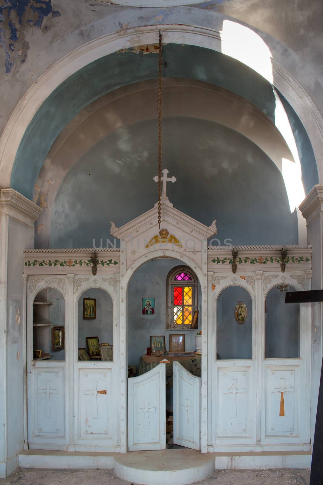 Old abandoned orthodox church in Greece, left including all the equipment.