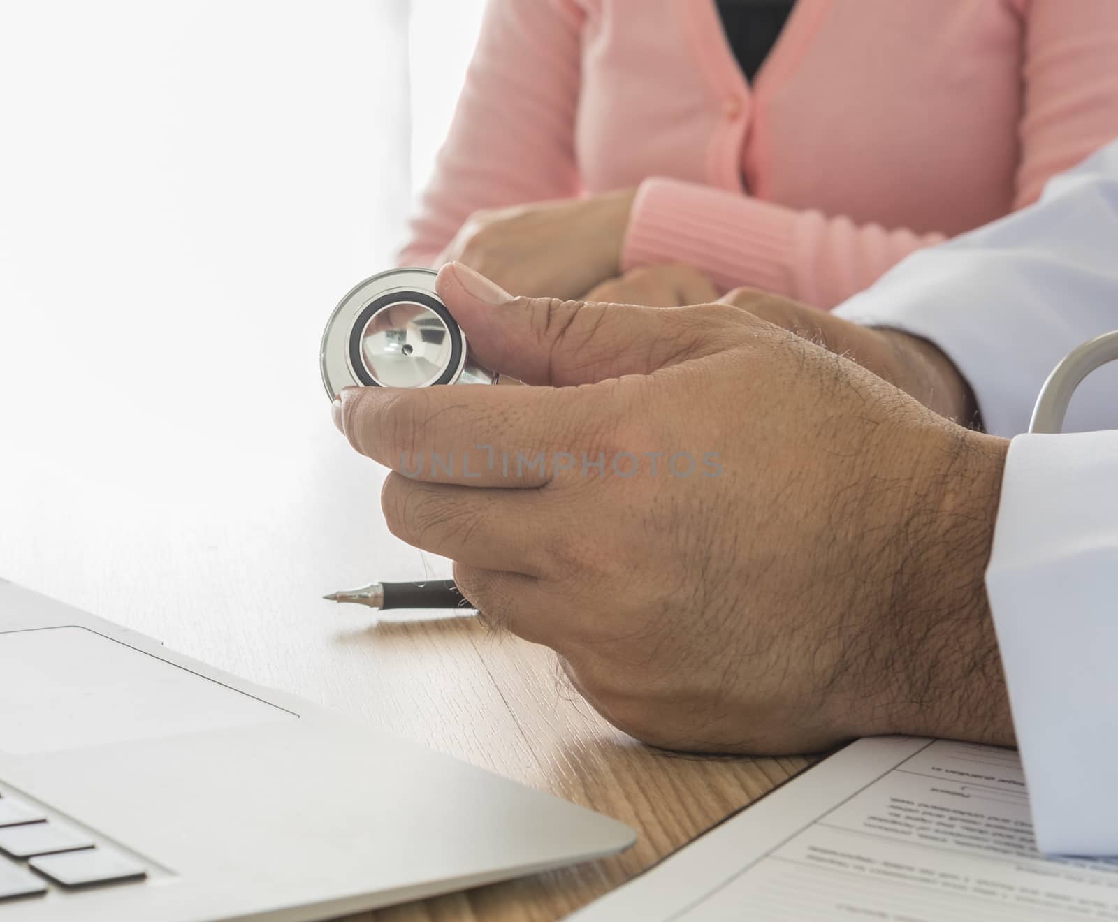 Doctors use stethoscope inspect the patient