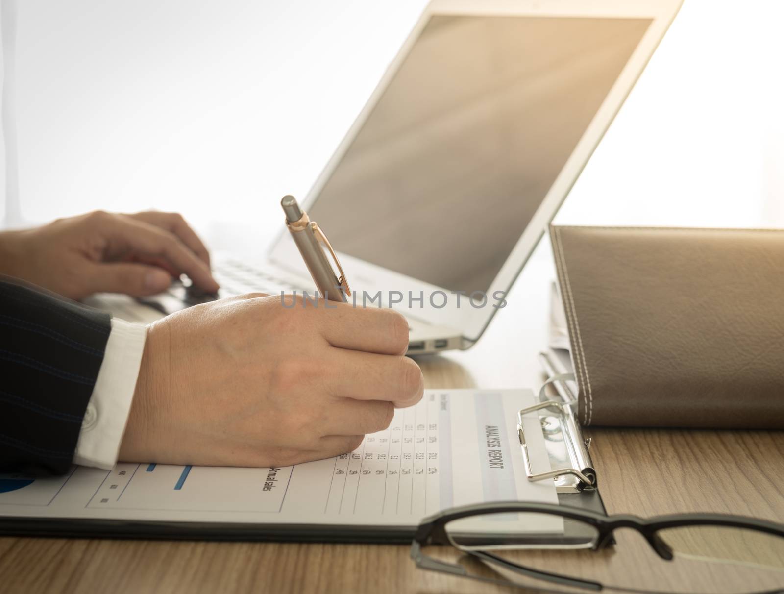 Accountants are preparing information to present to the executive.