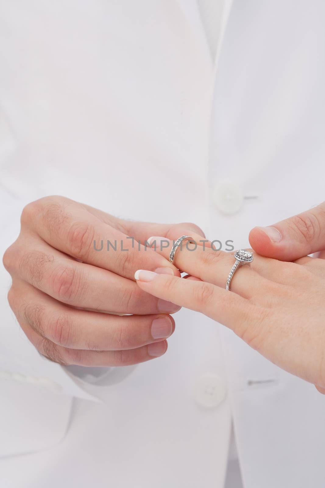 close up view of humans hands wedding