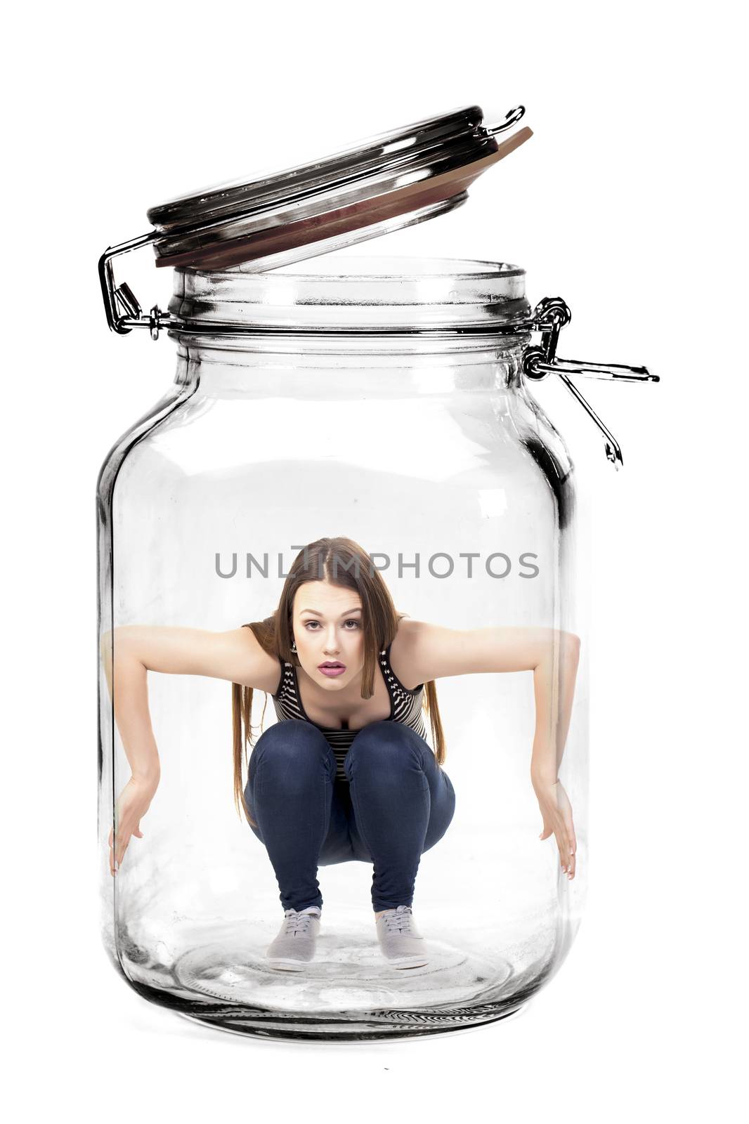 Woman trapped in glass jar.