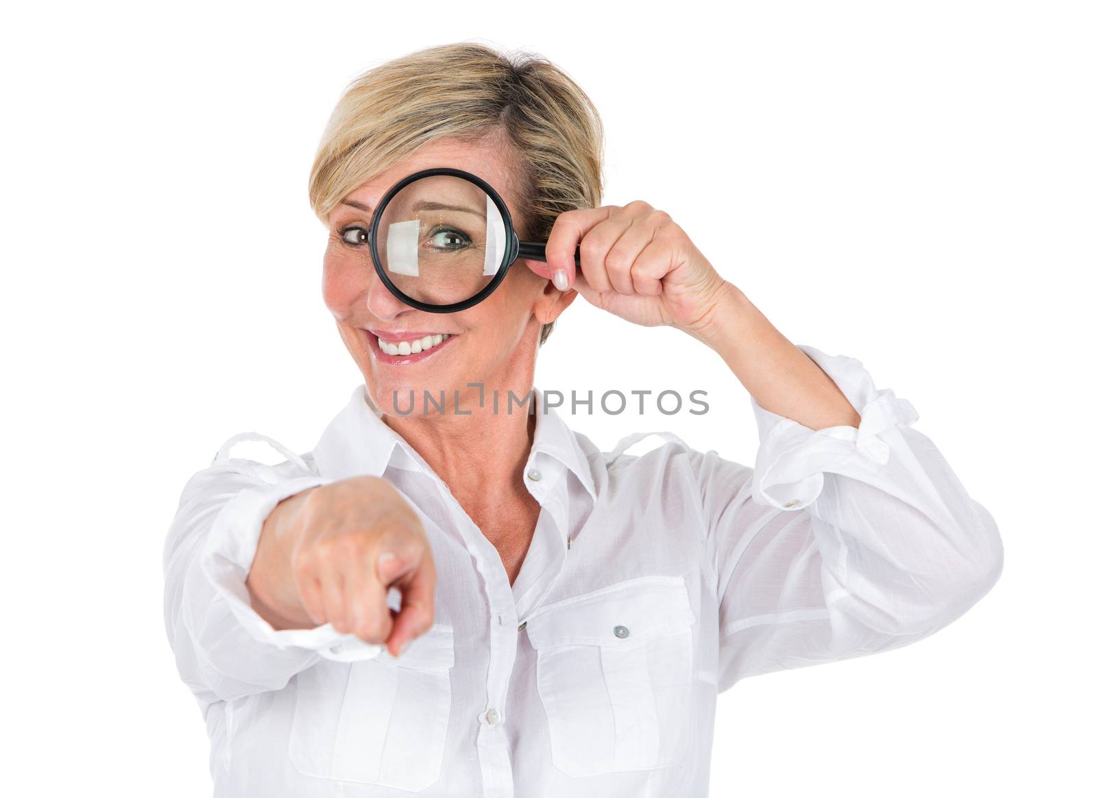 manager woman looking through magnifying glass by Flareimage