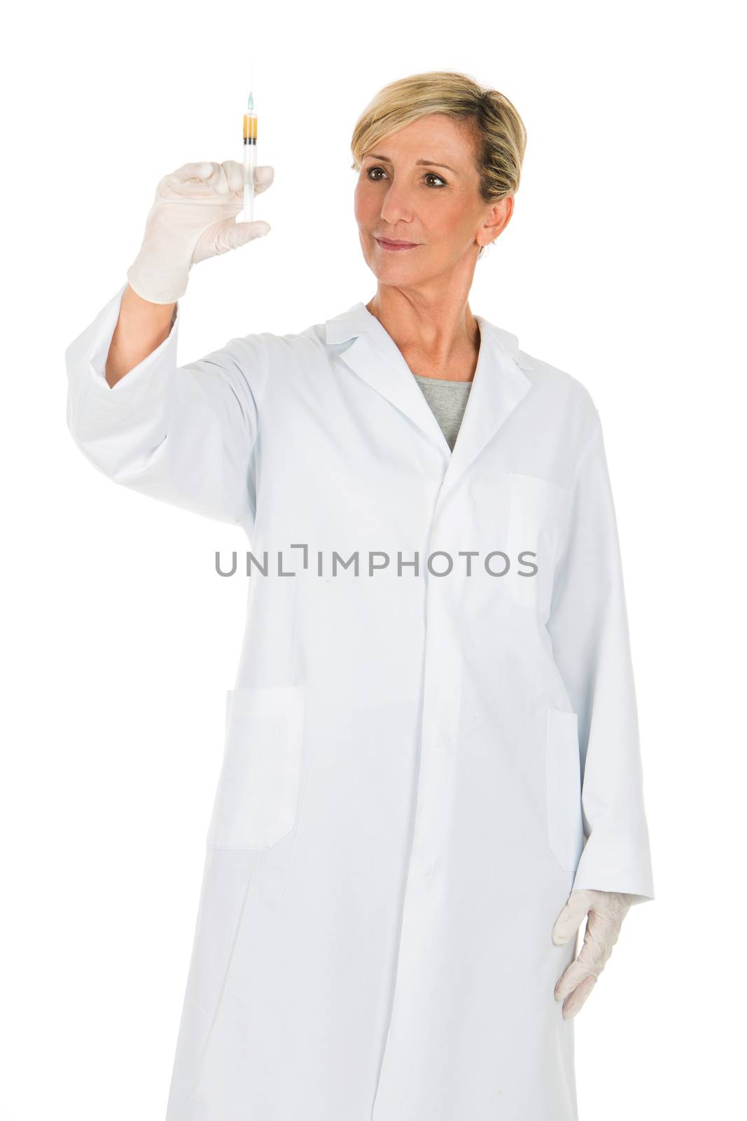 middle age woman doctor with syringe by Flareimage