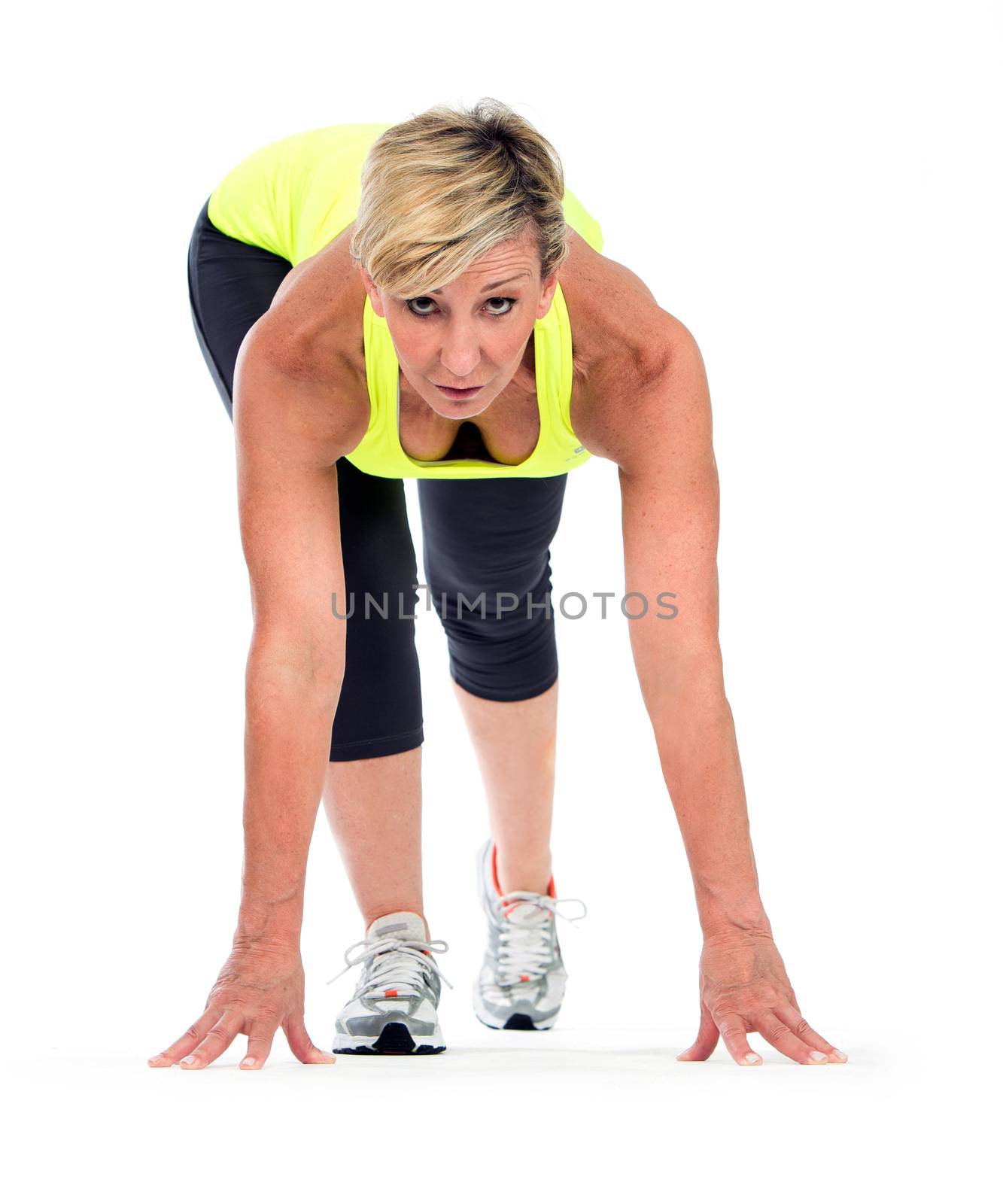 fitness middle age woman in a start position