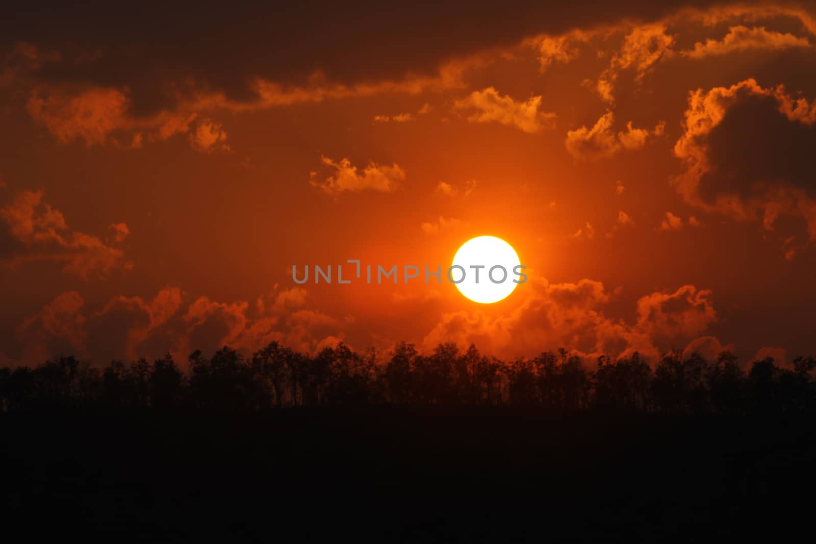 orange sunset on mountain in thailand