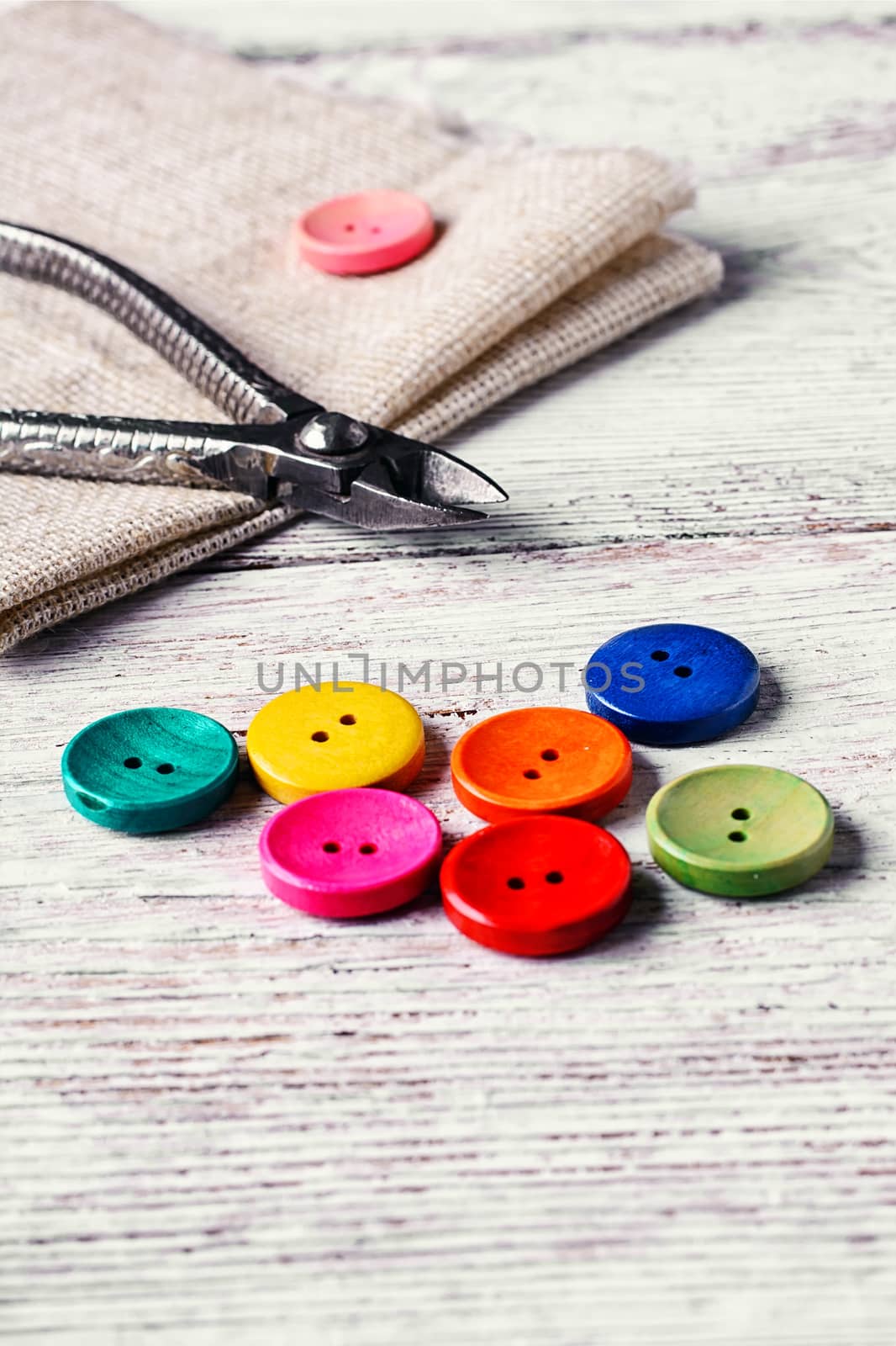 Buttons of different colors and accessories for needlework