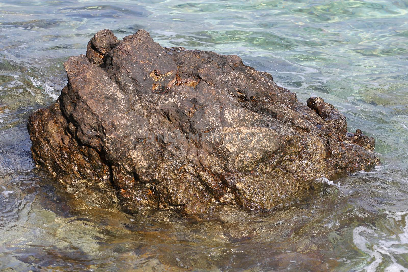 close up rock on sea  by pumppump