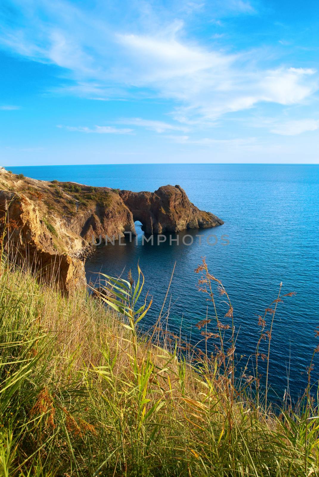 Sea landscape with grotto in the rock