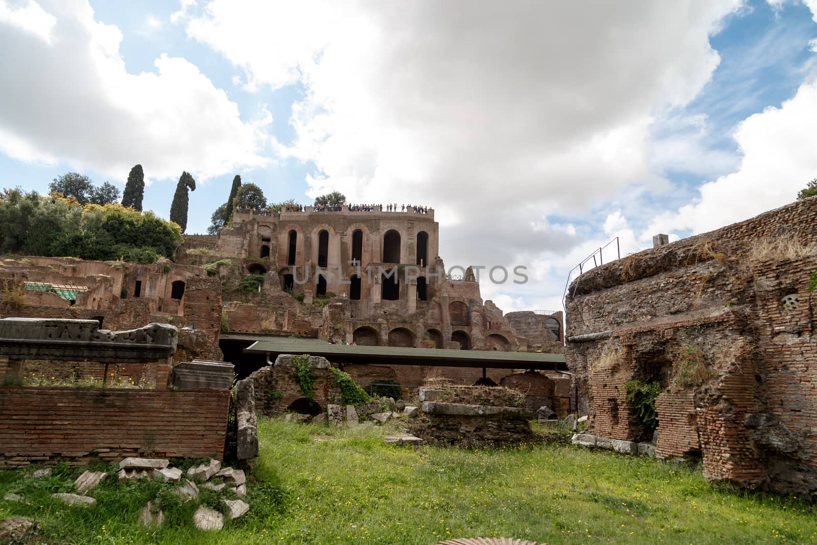 ROME, ITALY - SEPTEMBER 24, 2015 : View of archeological area of ancient Roman Forum in Rome, on cloudy blue sky background.