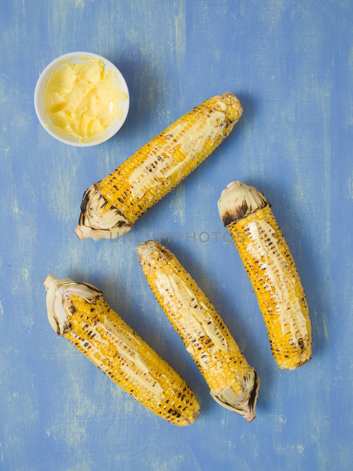 rustic grilled golden corn cob by zkruger