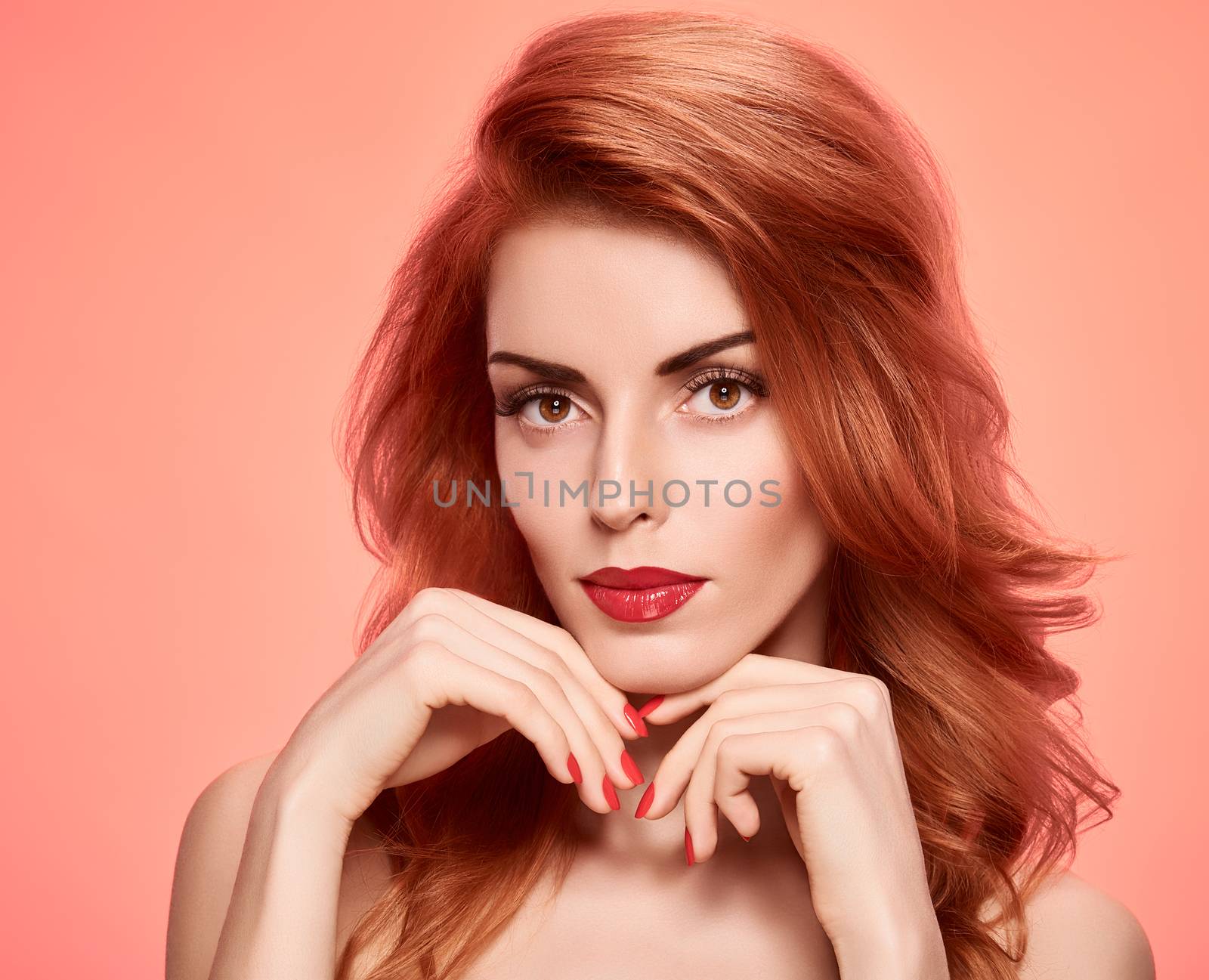 Beauty portrait nude woman, eyelashes, perfect skin, natural makeup, red lips, fashion. Gorgeous sensual attractive pretty redhead sexy model girl on pink, shiny wavy hair. People face, spa, copyspace