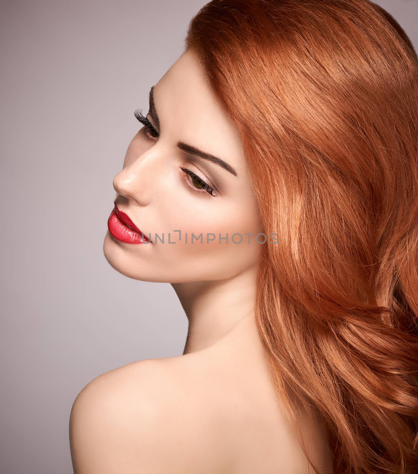 Beauty portrait nude woman, eyelashes, perfect skin, natural makeup, red lips, fashion. Gorgeous sensual attractive pretty redhead sexy model girl, shiny wavy hair. People face closeup, spa, copyspace