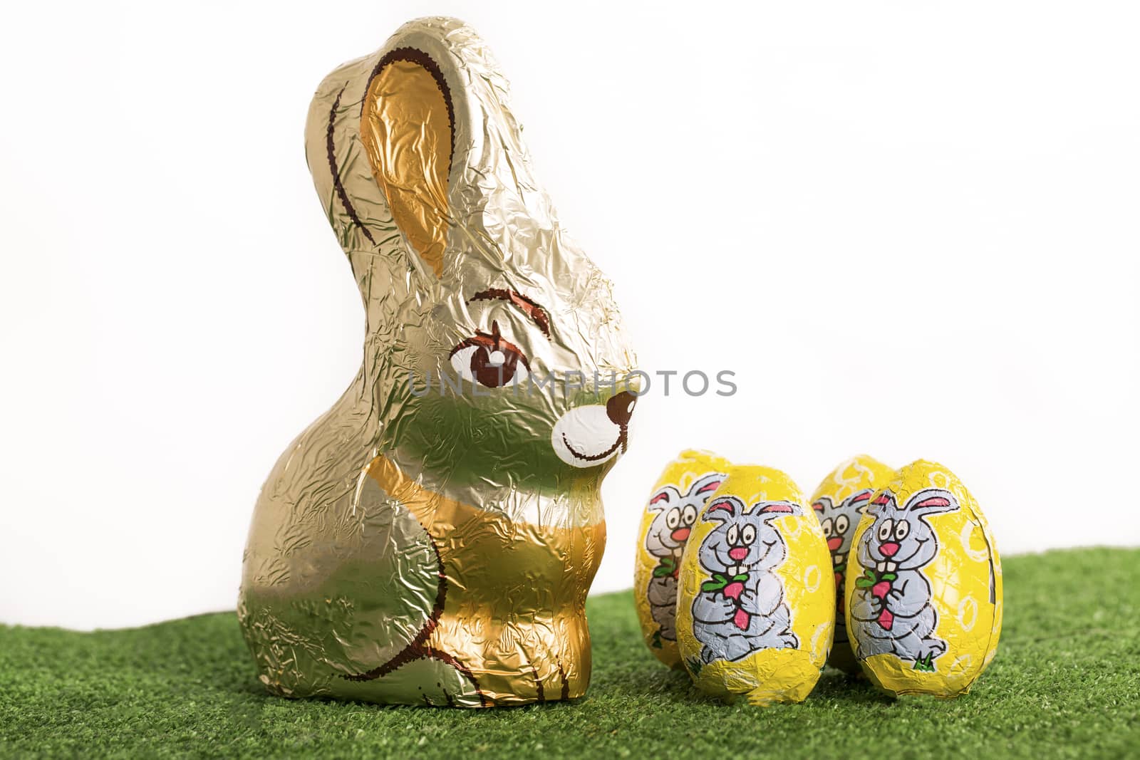 Group of colorful candy Easter eggs wrapped in foil 