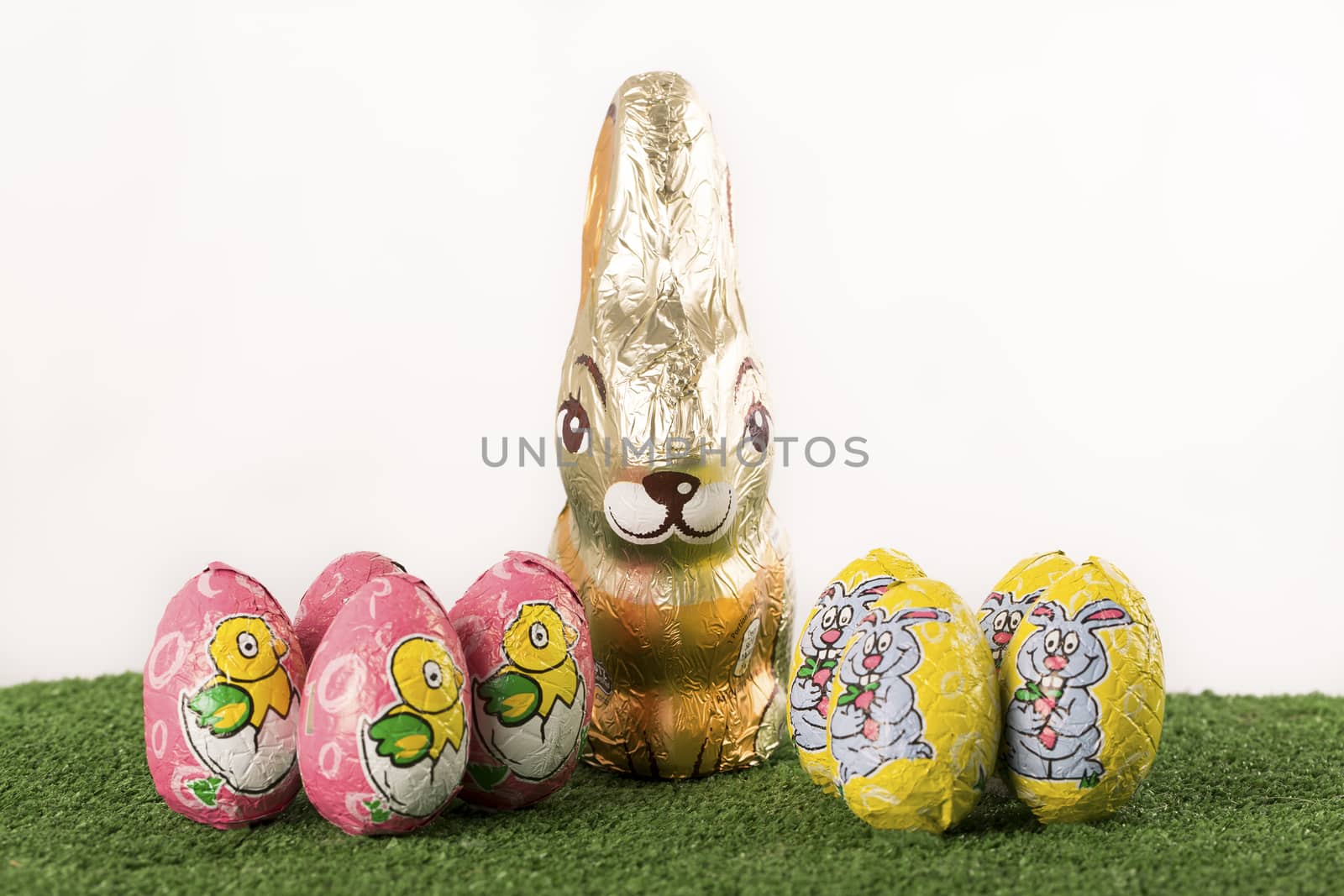 Group of colorful candy Easter eggs wrapped in foil 