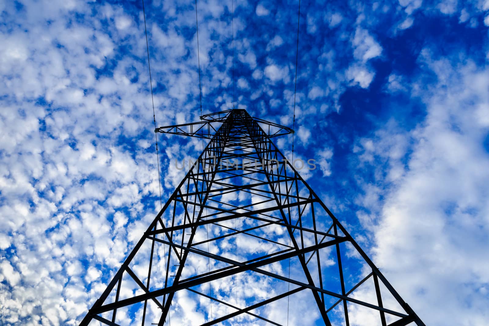 power line on blue sky background with clouds