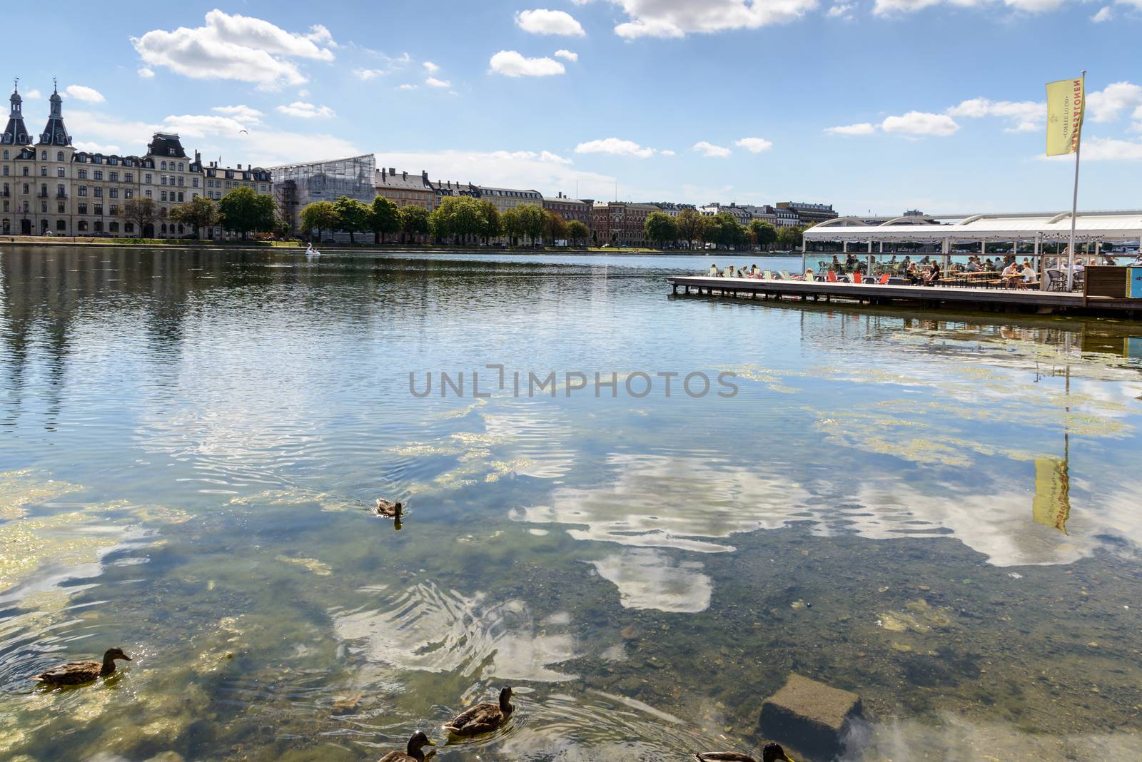 Copenhagen, Denmark - August 05, 2015 : the lakes in Copenhagen, Denmark is a row of 3 rectangular lakes curving around the western margin of the City centre, forming one the oldest and most distinctive features of the city's topography. The paths around them are popular with strollers and runners. Copenhagen, Denmark.