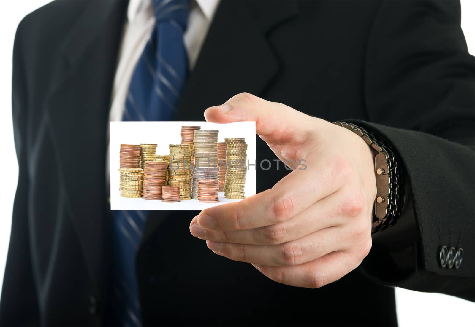 Businessman showing card with stack of euro coins 