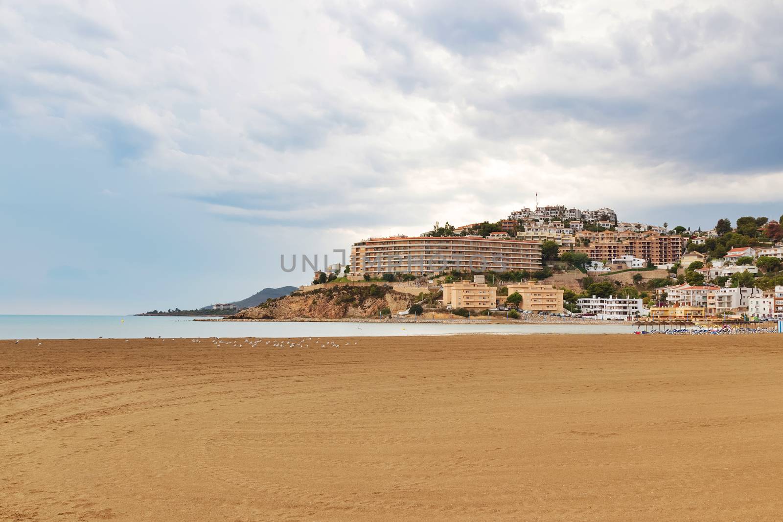 View over the beach and hotels of Baix Maestrat in Peniscola, the resort in the province of Castellon, Valencian Community, Spain.