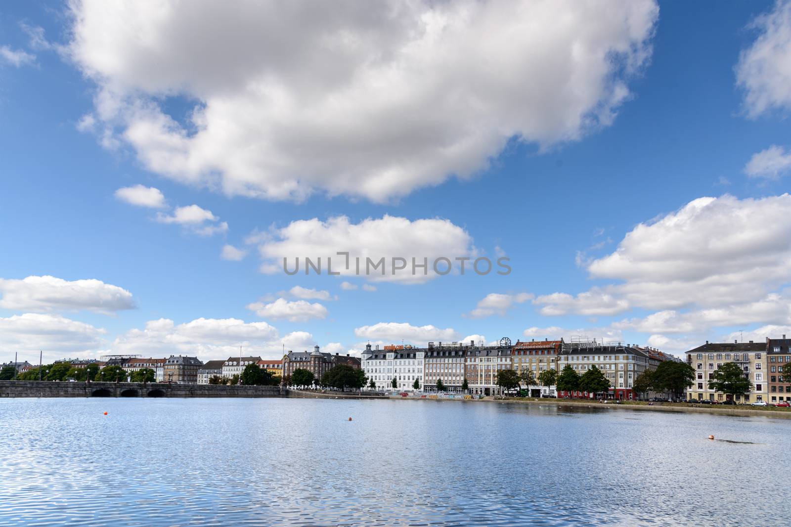 Copenhagen, Denmark - August 05, 2015 : the lakes in Copenhagen, Denmark is a row of 3 rectangular lakes curving around the western margin of the City centre, forming one the oldest and most distinctive features of the city's topography. The paths around them are popular with strollers and runners. Copenhagen, Denmark.