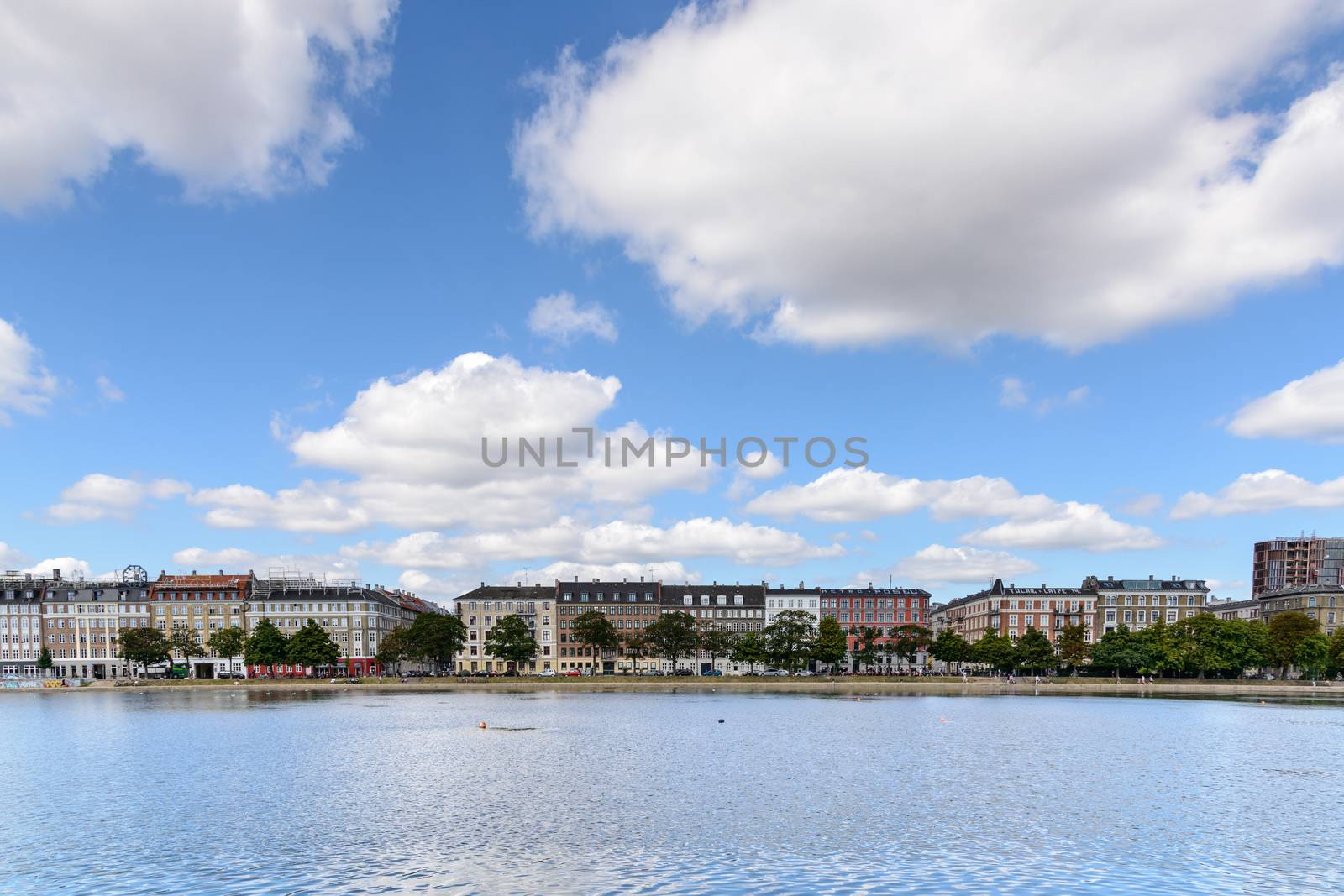 Copenhagen, Denmark - August 05, 2015 : the lakes in Copenhagen, Denmark is a row of 3 rectangular lakes curving around the western margin of the City centre, forming one the oldest and most distinctive features of the city's topography. The paths around them are popular with strollers and runners. Copenhagen, Denmark.
