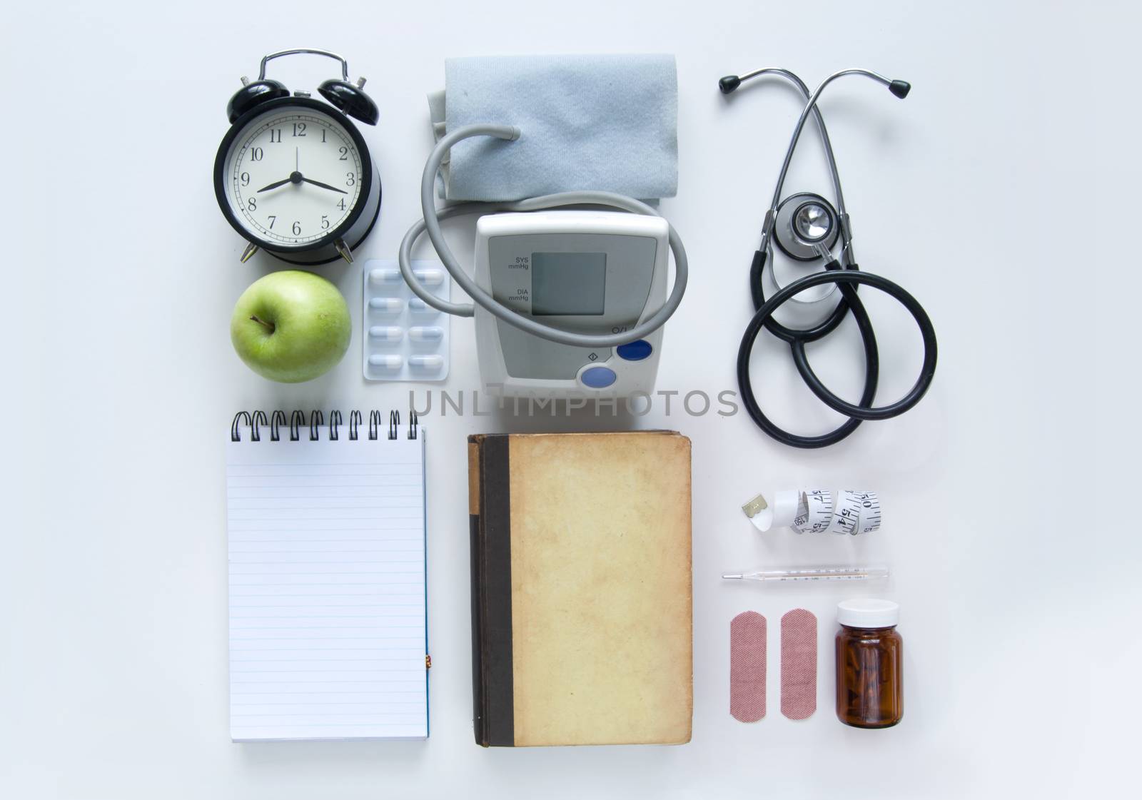 Medical objects laid out on a white table