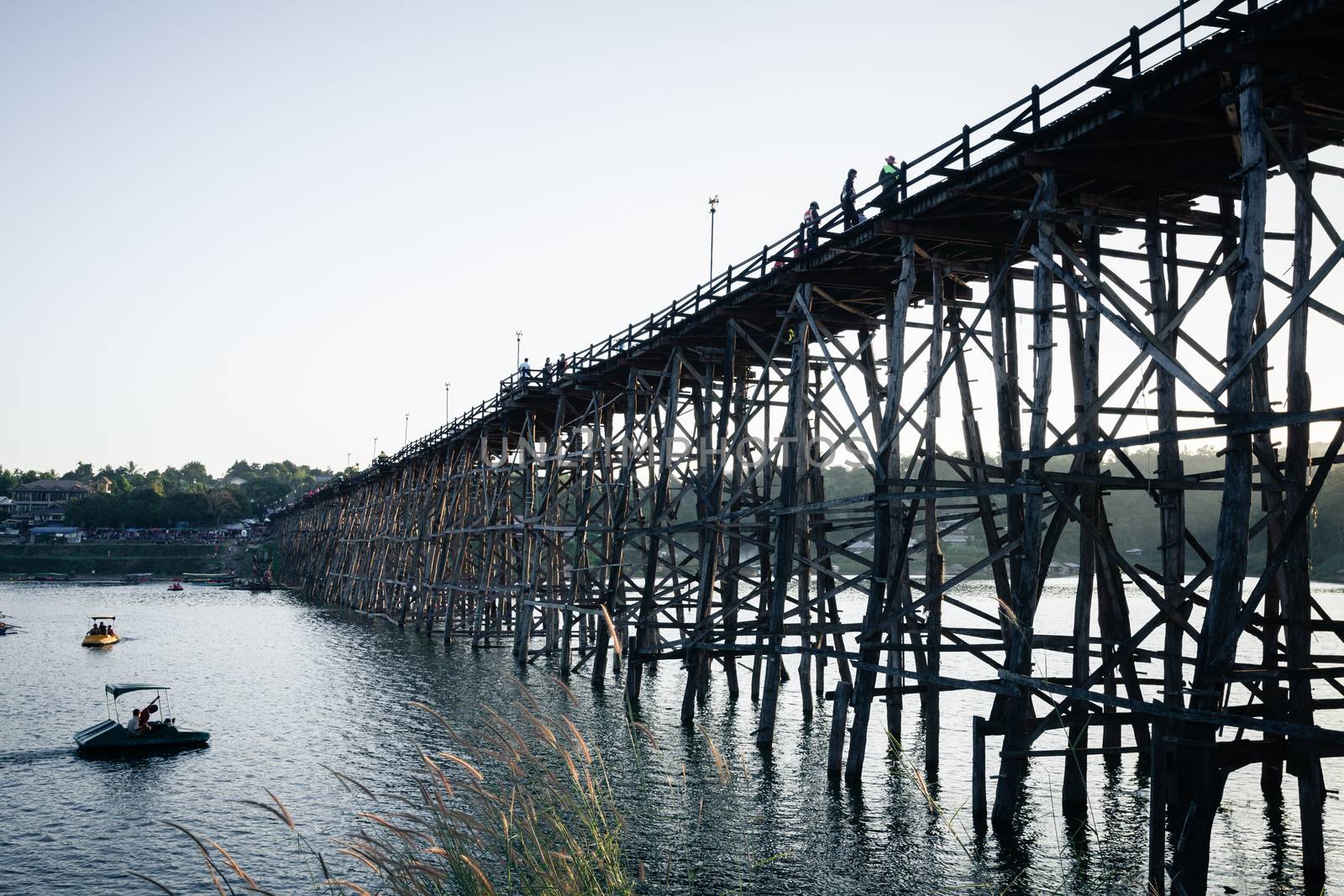 Utamanusorn Bridge (Mon Bridge), made from wooden for across the by FrameAngel