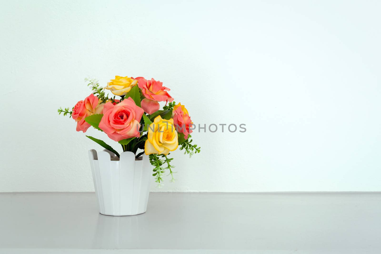 flower on white table by FrameAngel