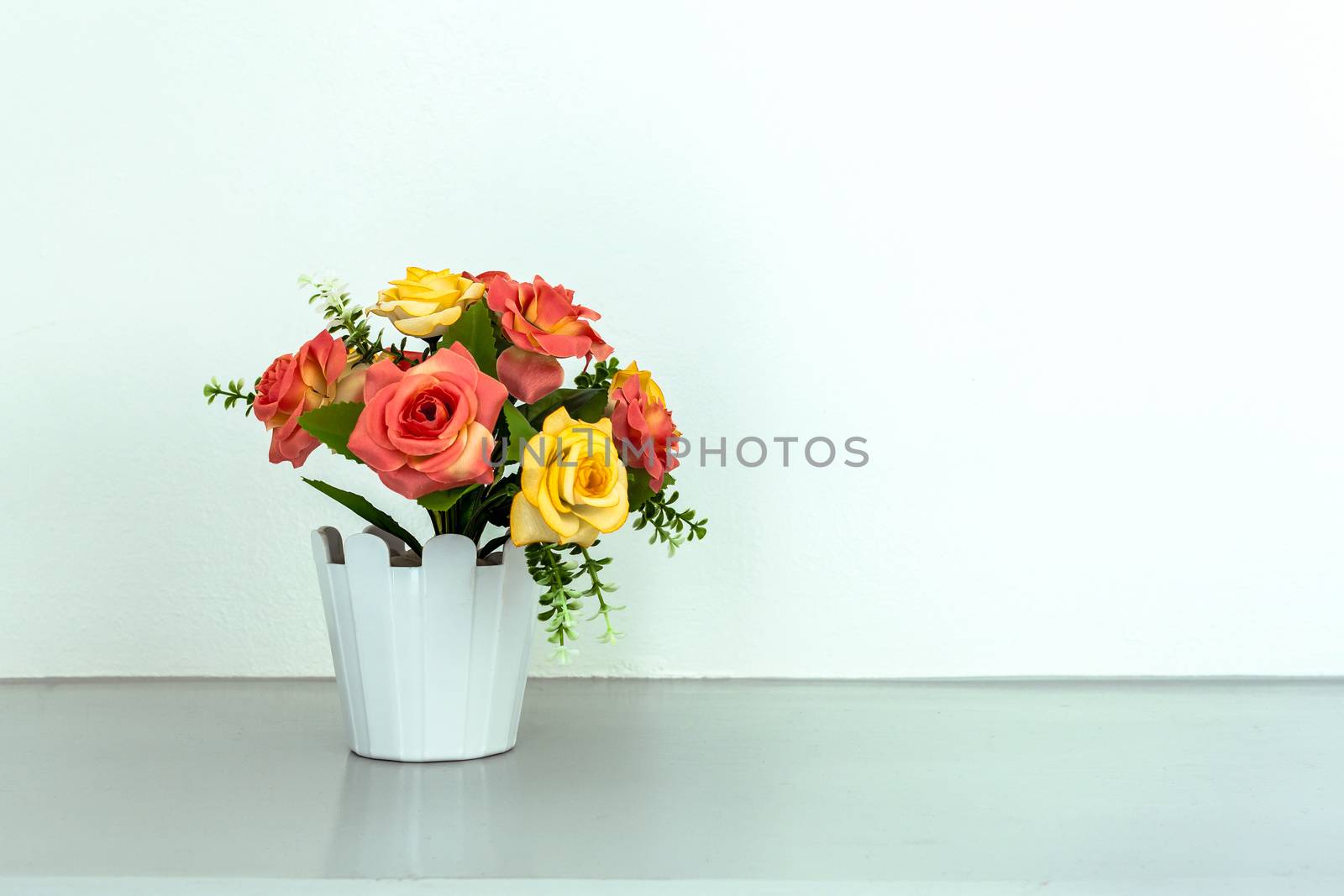 flower on white table by FrameAngel