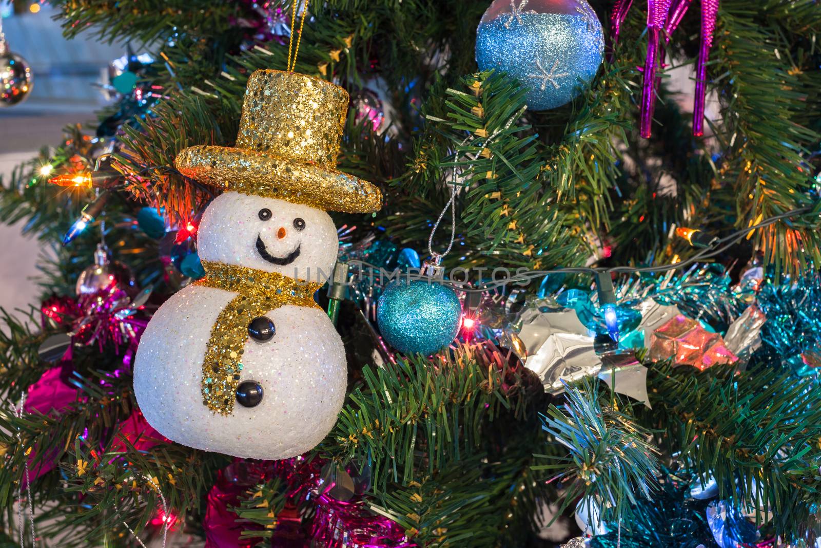 snowman and Christmas Balls on Christmas Tree