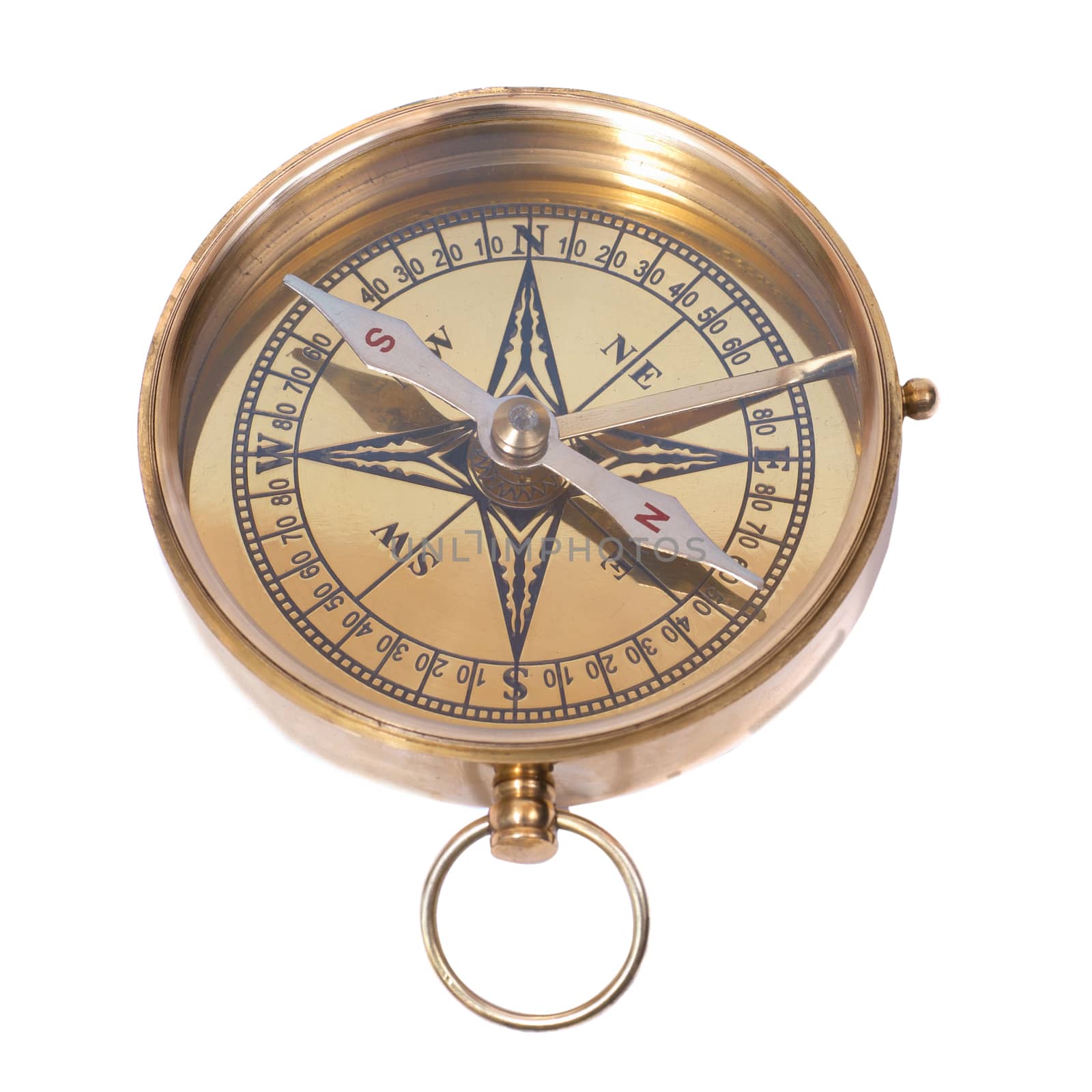 Golden ancient compass isolated on white background