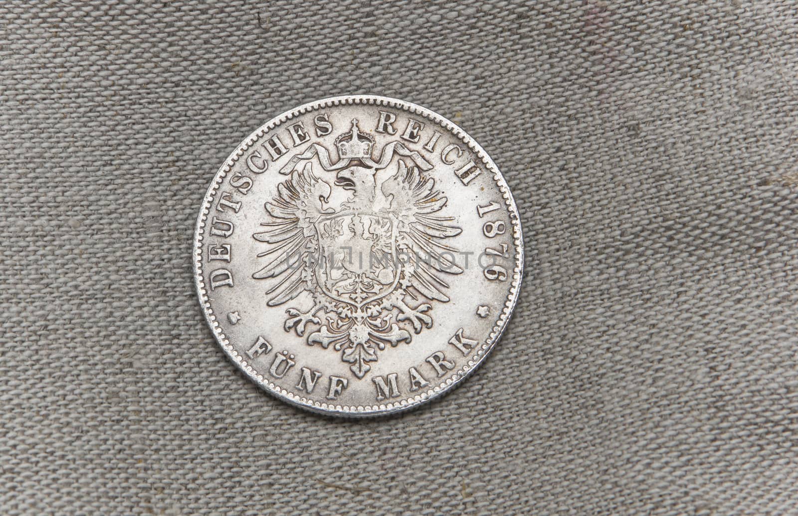 Old silver German reich five mark on sack