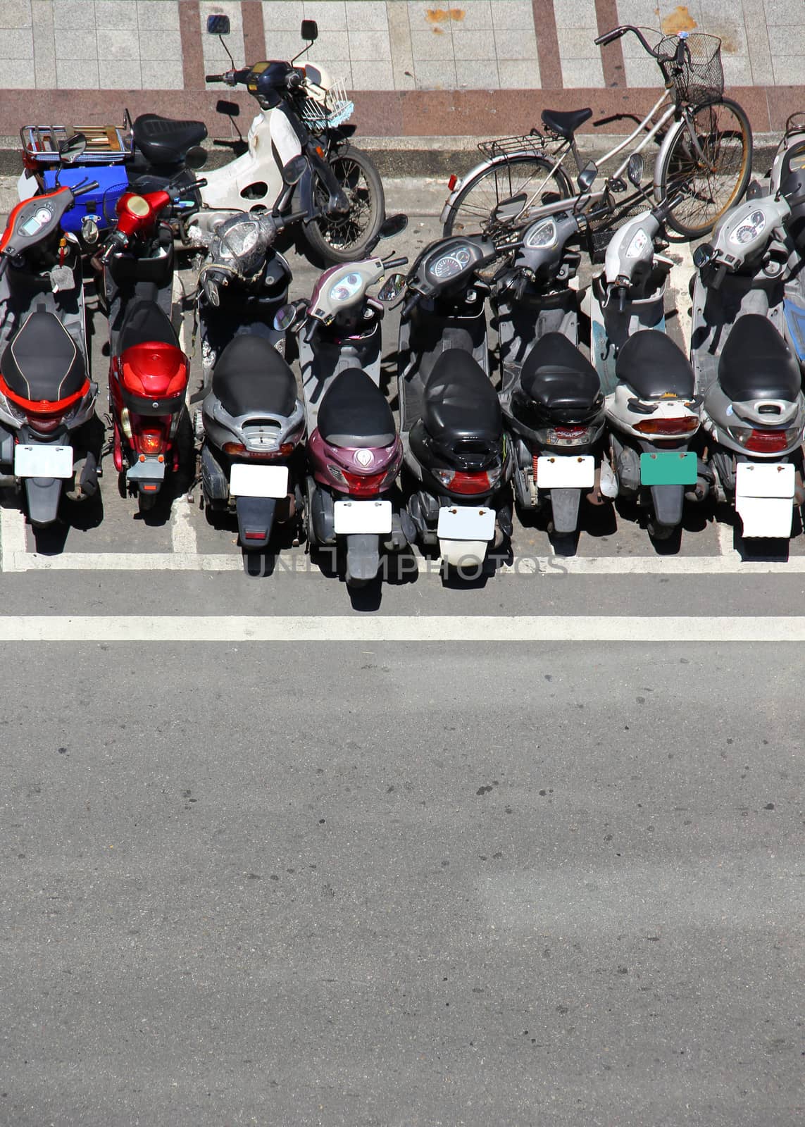 Top view motorcycle parking with street in city