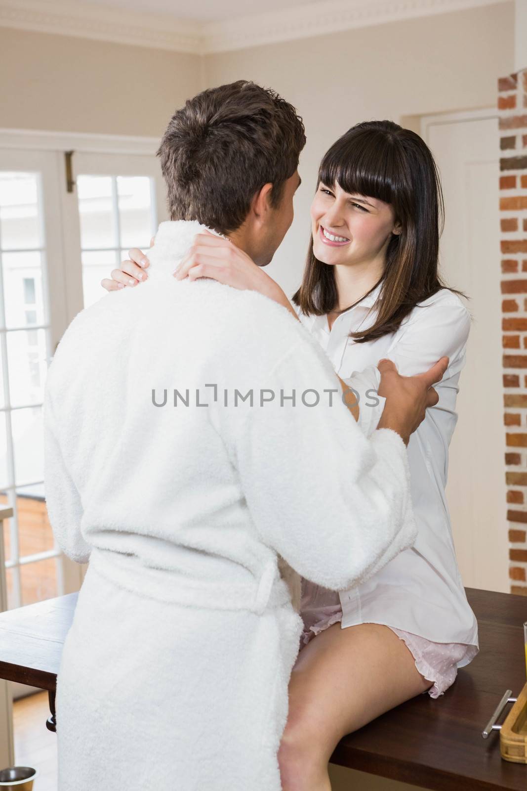 Young couple embracing each other by Wavebreakmedia