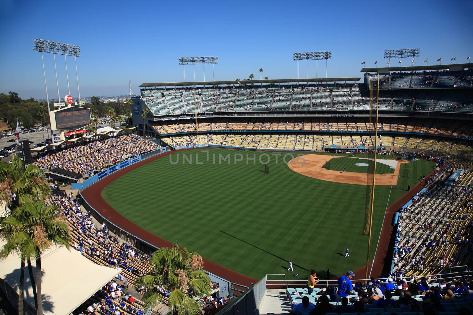 A sunny day baseball game at Dodger Stadium. Outfield view of Dodgers ballpark.