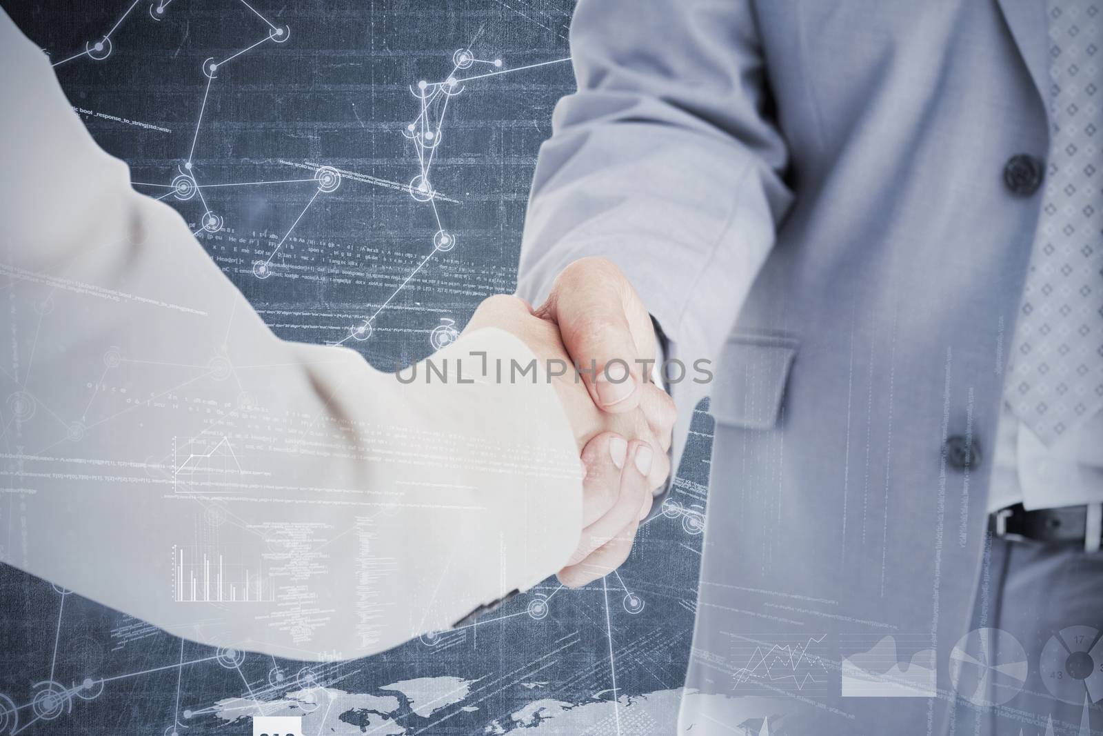 Composite image of people in suit shaking hands by Wavebreakmedia